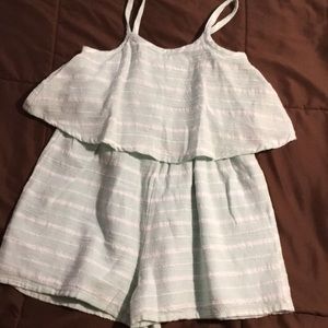 Light mint and white striped color romper.